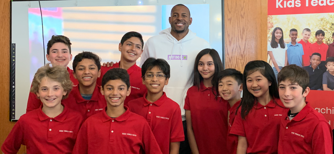 Slide Image - team posing with basketball player