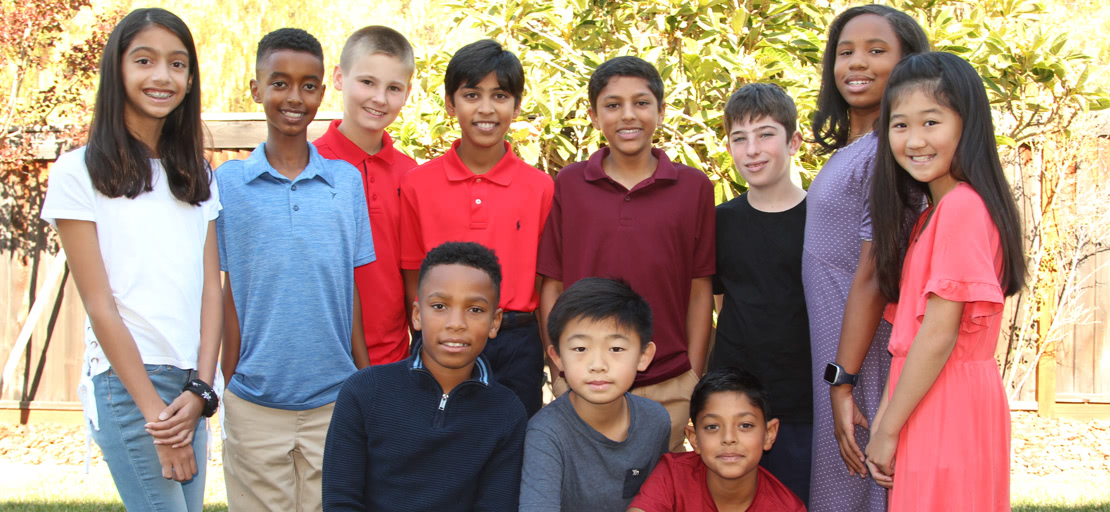 slide image - team posing for picture